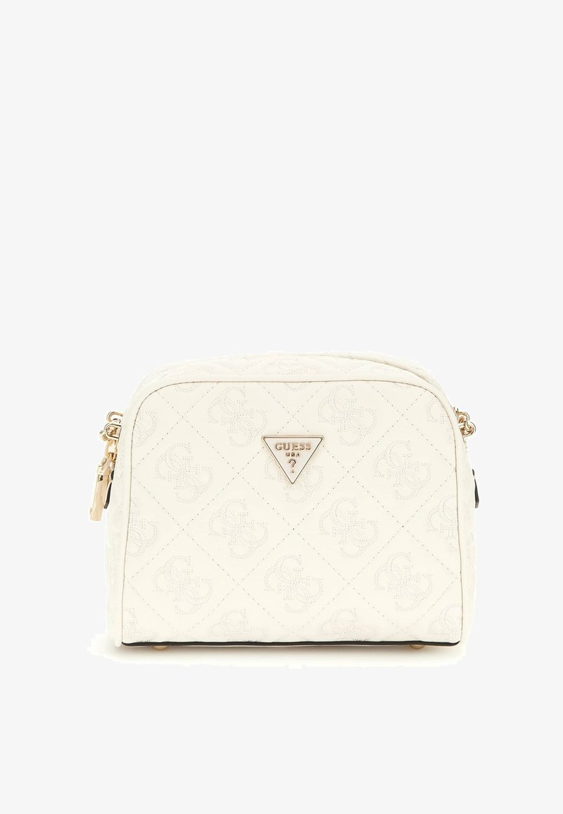 Kremowa torebka pikowana z złotawymi akcentami i logo w kształcie trójkąta, z zamkiem błyskawicznym i zaokrąglonym kształtem. Gładka faktura i usztywniony kształt.