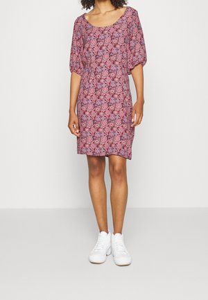 Patterned dress featuring a red and blue floral design, short puff sleeves, and a wide neckline, paired with white sneakers.