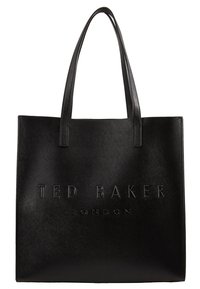 Black tote bag made of textured material with two sturdy handles. Features embossed lettering "TED BAKER LONDON" on the front.
