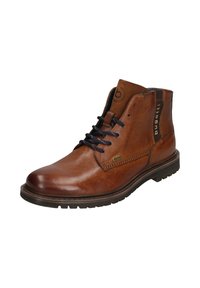 Braune Leder-Ankelboots mit glatter Oberfläche, runder Zehenform, marineblauen Schnürsenkeln und einer strukturierten Gummisohle. Mit Markenlogo und Nähdetails.