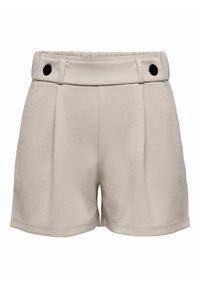 Shorts beiges en tissu texturé, dotés d'une large ceinture, de plis et de deux accents en boutons noirs à l'avant.