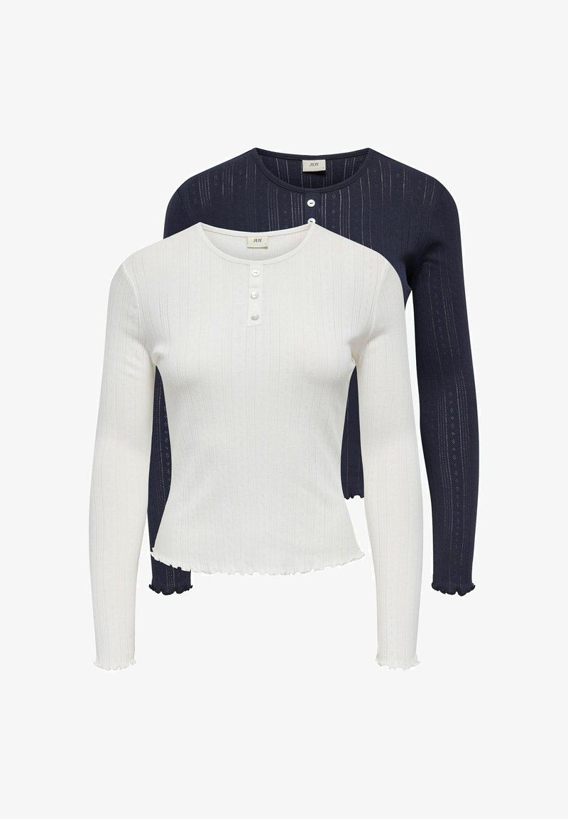 Dwa długie topy z długim rękawem, jeden biały, drugi granatowy, o prążkowanej fakturze, z przodem na guziki i ozdobnym karbowanym wykończeniem na dole.