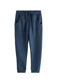 Tumesinised dressipüksid pehmest materjalist, millel on elastne vöökoht paelaga, küljetaskud ja soonikkoes mansetid.