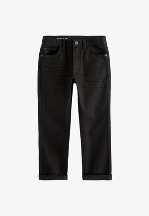 Pantalones vaqueros negros de mezclilla con botón frontal, trabillas para cinturón, cinco bolsillos y puños enrollados, colocados planos sobre fondo blanco.