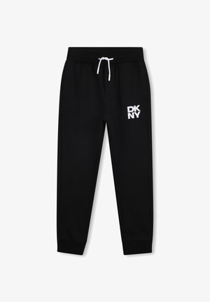 Zwarte sweatpants van zachte stof, met een wit DKNY-logo op de linkerdij, een elastische tailleband en boorden bij de enkels.