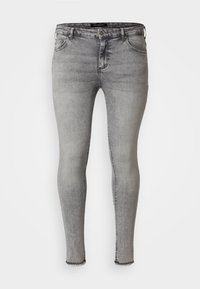 Vaqueros ajustados grises con un lavado descolorido, diseño de cinco bolsillos, cierre de cremallera y detalle de dobladillo deshilachado. Hechos de denim con un ligero estiramiento.