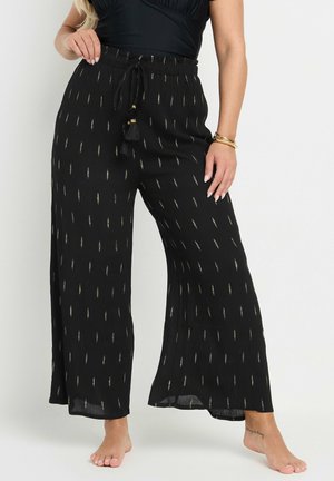 Pantaloni neri a gamba larga con vita regolabile, caratterizzati da un sottile motivo dorato su tutta la superficie. Tessuto leggero con una vestibilità comoda e orlo aperto.