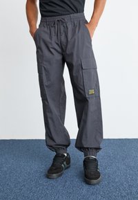 Champion Rochester SURPLUS CUFF PANTS - Cargobukse - black