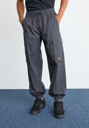 SURPLUS CUFF PANTS - Kapsáče - black