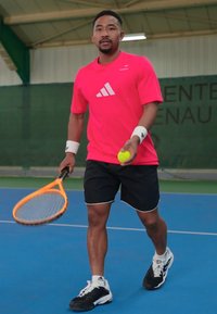 adidas Performance PADEL CAT GRAPHIC TEE - Sports T-shirts - semi lucid red