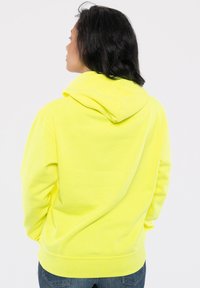 Paradiso Clothing NIRVANA INVERSE GRUNGE SMILE - Hoodie - yellow