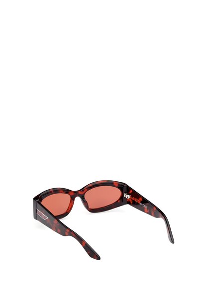 Red-tinted sunglasses with a tortoiseshell frame. Angular design, smooth texture, and silver accent detailing on the temples.