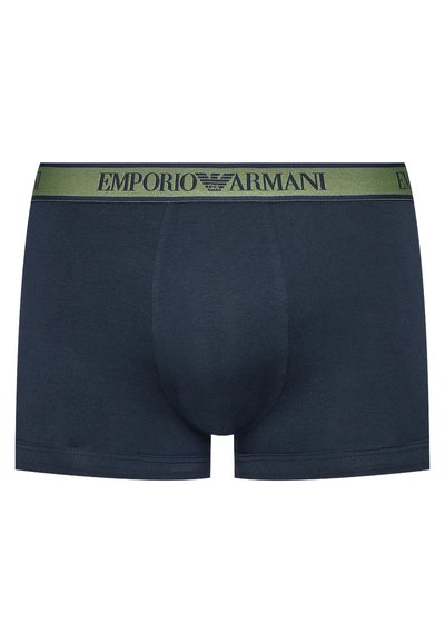 Navy blue boxer briefs with a green elastic waistband featuring "EMPORIO ARMANI" logo. Smooth texture, fitted design, and contoured pouch.