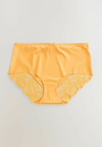 Gula trosor med en slät tygfront och en vågig spetsbakdel, prydda med ett blommigt mönster och en liten rosett vid midjan.