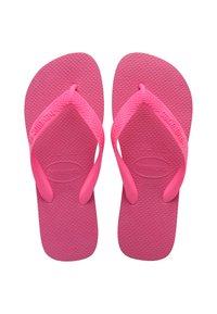 Rózsaszín gumiflip-flopok, textúrált talppal és széles pántokkal. A pántokon látható márkajelzés, a méret 37-38, lapos és könnyű kialakítás.