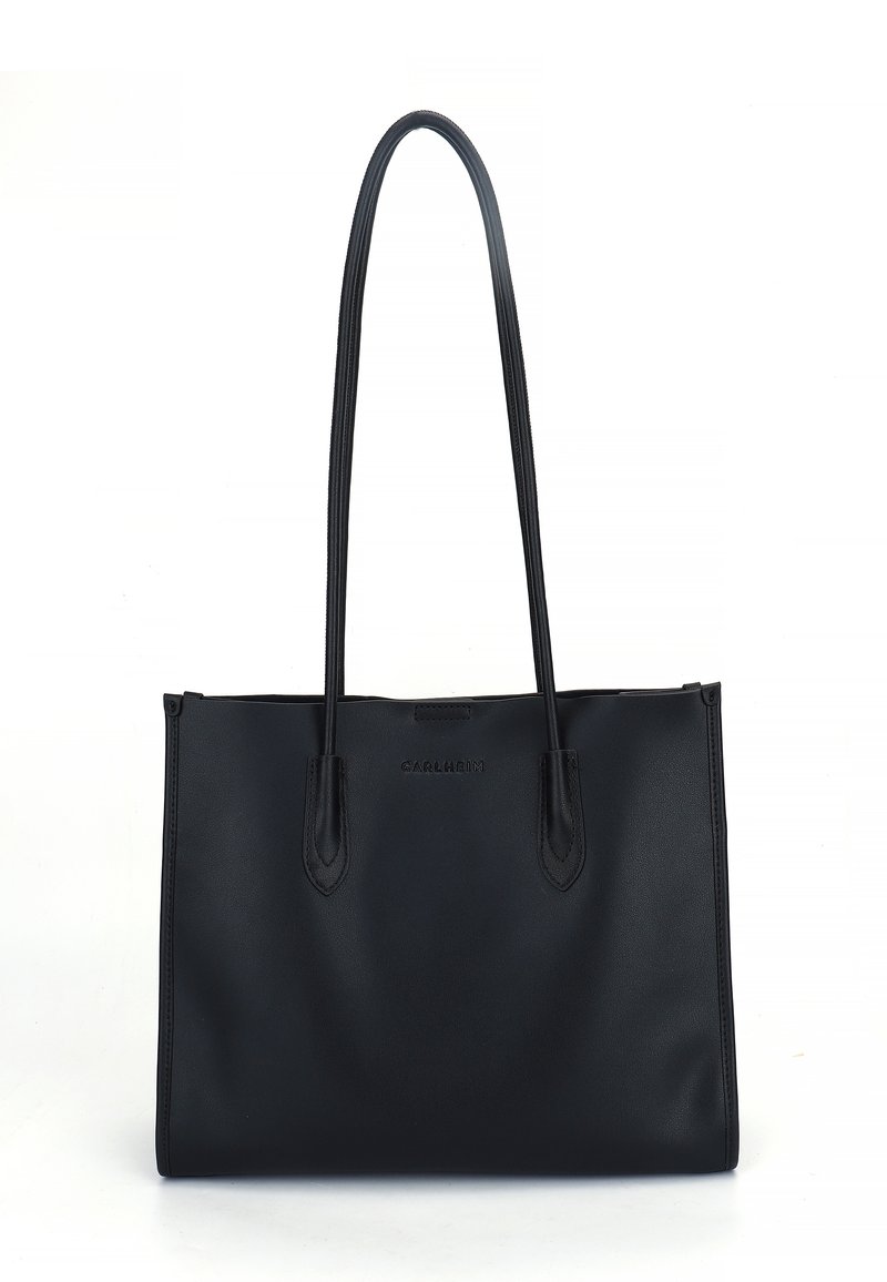 Black leather tote bag with dual handles, rectangular shape, smooth texture, and subtle branding on the front. Minimalist design, no additional accents.