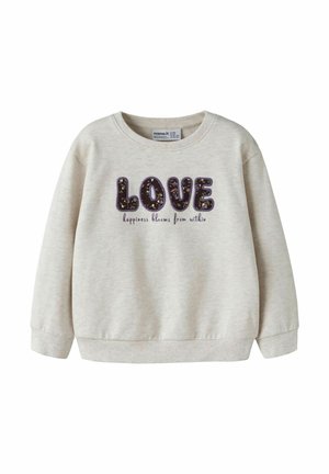 Sweat-shirt beige clair avec le mot "LOVE" en grandes lettres florales et "happiness blooms from within" écrit en dessous en petit script.