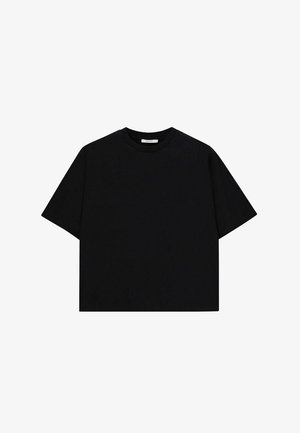 Black cropped t-shirt made from cotton, featuring a round neck, short sleeves, and a smooth texture with no visible patterns or accents.