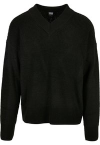 Suéter negro de punto con escote en V, textura de canalé ancha, hombros caídos y mangas largas, con un corte relajado y color sólido.