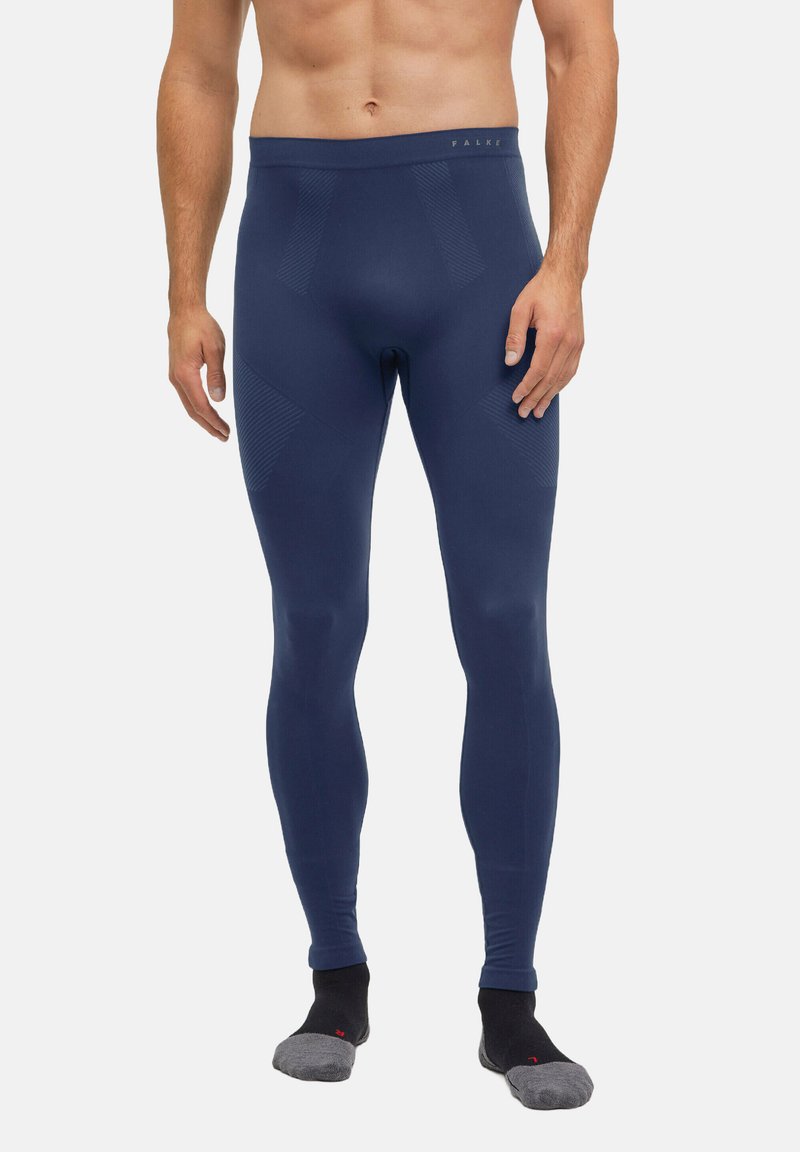 Navy blue leggings made from stretch fabric, featuring a fitted silhouette, seamless waistband, and textured accents along the thighs.
