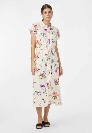 Robe à boutons florale en crème, avec des manches courtes, une taille cintrée et une longueur sous le genou ornée de motifs de fleurs multicolores.
