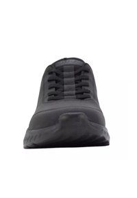 Scarpa sportiva nera con una tomaia liscia in materiale sintetico, dotata di sei fori per i lacci, una linguetta imbottita e una suola in gomma testurizzata.