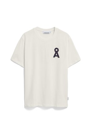 Weißes Baumwoll-T-Shirt mit kurzen �Ärmeln und Rundhalsausschnitt. Verfügt über ein strukturiertes, schwarzes bandähnliches Design auf der linken Brust.