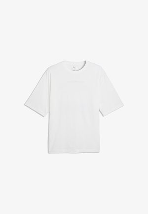 Prosty biały T-shirt z krótkim rękawem z małym, subtelnym logo Puma na piersi i okrągłym dekoltem.