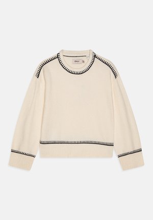 Crème trui met zwarte stikdetails langs de ronde hals en de zoom. Gemaakt van zacht breimateriaal, met lange, ontspannen mouwen.