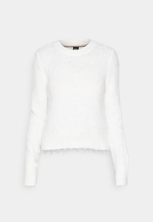 White fuzzy sweater with long sleeves, round neckline, and a cropped hem. Features soft texture and subtle fringing at the bottom.
