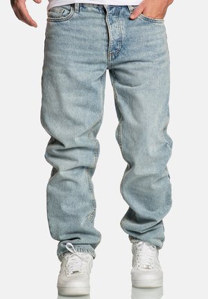 Light blue, loose-fit denim jeans with a faded finish, featuring a classic five-pocket design and a button-fly closure.