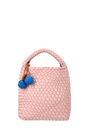 Pink woven handbag with a braided handle and two blue knotted ball charms attached by brown leather straps.