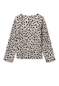 Μπλούζα με μακριά μανίκια σε μπεζ χρώμα με μαύρες πουά, με λαιμόκοψη βαρκούλα και μανσέτες με ρυθμιζόμενη πιέτα, υφασμάτινη υφή με διακριτική ελαστικότητα.