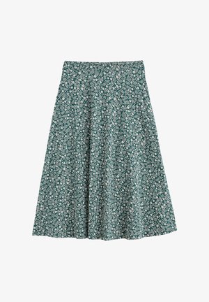 Rohelise värvi A-lõikeline seelik valgete lille- ja lehemustritega, elastse vöökohaga, põlvpikkune, kerge kangas.