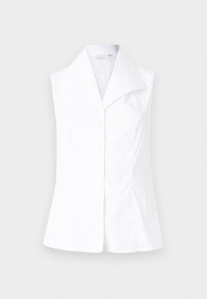 White sleeveless blouse with a pointed collar, featuring a button-down front and a tailored fit that flares at the waist. Smooth fabric texture.