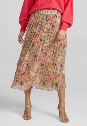 Plissé midirok in beige met een levendige bloemenprint in roze en groen. Voorzien van een elastische tailleband en een luchtige, lichte stof.