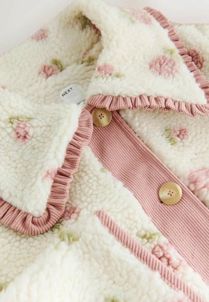 Floral-patterned fleece jacket with a cream base and pink ruffled collar. Features pink ribbed placket and round buttons. Soft texture.