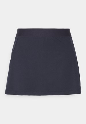 Mini falda azul marino hecha de un tejido suave y elástico. Presenta un cinturón ancho y elástico, y un corte simple y limpio sin acentos adicionales.