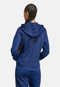 adidas Performance FUSSBALL - TEAM TIRO TRAVEL KAPUZEN - Sweatjacke - blau