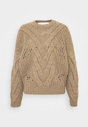 Kastiger beiger grob gestrickter Pullover mit langen Ärmeln und geripptem Rundhalsausschnitt sowie Saum, mit Details eines offenen Strickmusters.
