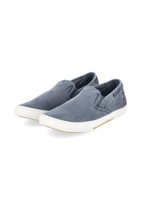 Paire de chaussures en toile grises sans lacets avec semelles en caoutchouc blanc sur fond blanc, montrant les côtés gauche et droit.