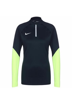Černé sportovní tričko s dlouhým rukávem, neonově žlutými spodními částmi rukávů, bílým logem Nike na hrudi a krátkým předním zipem.