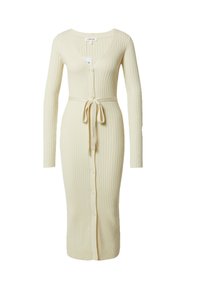 Langärmliges, knielanges cremefarbenes Strickkleid mit gerippter Textur, V-Ausschnitt, Knopfverschluss und Taillengürtel.