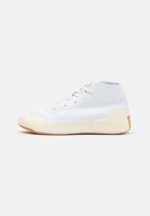 White high-top sneaker with a smooth synthetic upper, rubber sole, and beige accent on the heel; features white laces and stitch detailing.