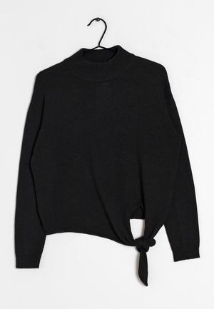 Stickad tröja - black