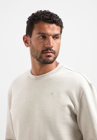 NO EXCESS WITH BACKPRINT - Sweater - kit