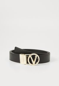 Kijelölve, nero/oro