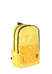 Yellow backpack with black accents, featuring a large orange "CURIOUS" text pattern on the front, two zippered compartments, and a side pocket.