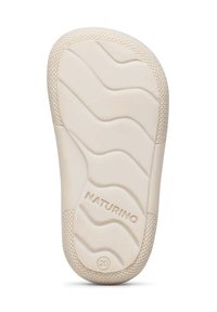 Suola della scarpa color crema con un motivo ondulato e bordi testurizzati. Dimensioni: taglia 20 marcata, nome del marchio "NATURINO" impresso.
