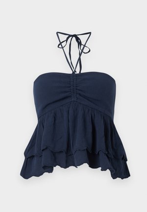 Navy blue strapless top with a gathered bodice, ruffled hem, and thin neck ties. Soft, textured fabric with a relaxed fit, ideal for casual wear.